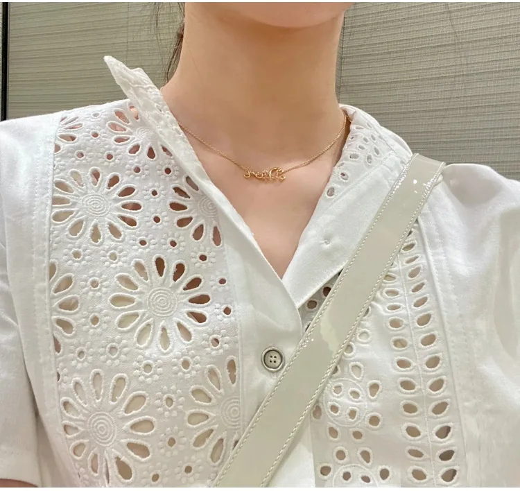 Женска бродирана однобортная бяла риза с къс ръкав, поплиновый топ, открита новост лятото 2023 Изображение 0